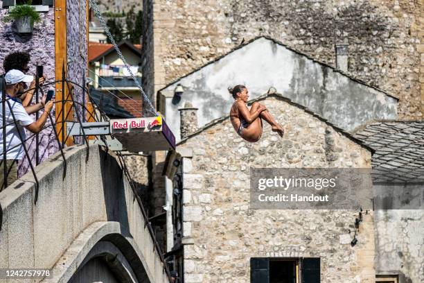 In this handout image provided by Red Bull, Adriana Jimenez of Mexico dives from the 21 metre platform on Stari Most during the final competition day...