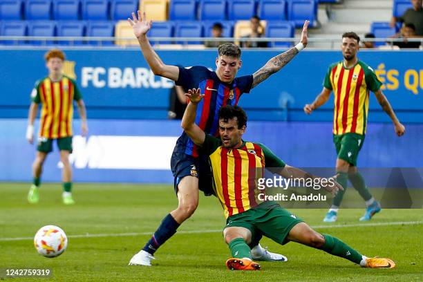 Barcelona Atleticâs Roberto Fernandez vies with CD Castellon player on the first Journey of Primera RFEF between Barcelona Athletic and CD Castellon...
