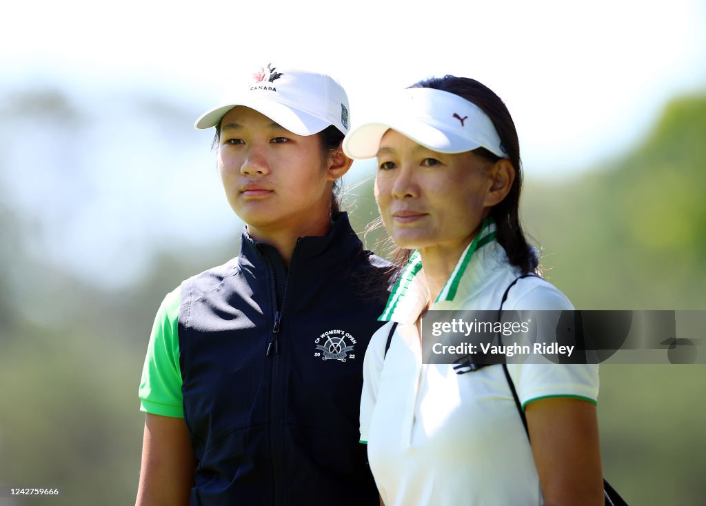 Lucy Lin Lucy Lin of Canada watches the golf with her mother and caddie Amanda ...