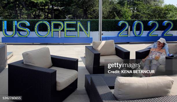 Woman relaxes during Arthur Ashe Kids' Day, ahead of the 2022 US Open Tennis tournament, at the USTA Billie Jean King National Tennis Center in New...