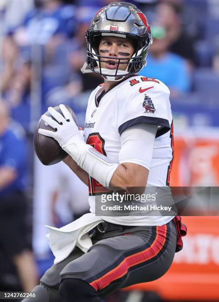 Tom Brady of Tampa Bay Buccaneers warms up before the game against the Indianapolis Colts at Lucas Oil Stadium on August 27, 2022 in Indianapolis,...