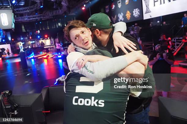 Seese hugs Cooks and Head Coach Lance Sessions II of Bucks Gaming after winning the 2022 NBA 2K League 5v5 Finals on August 27, 2022 at NBA 2K League...