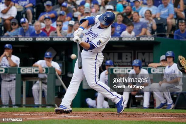 Nick Pratto of the Kansas City Royals hits a two-run double in the first inning against the San Diego Padres at Kauffman Stadium on August 27, 2022...