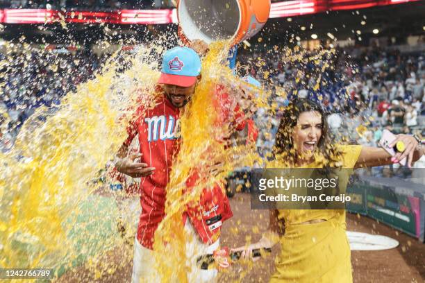 Sandy Alcantara of the Miami Marlins is showered in Gatorade by teammates after a complete game win against the Los Angeles Dodgers at loanDepot park...