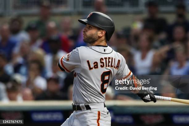 Tommy La Stella of the San Francisco Giants hits a sacrifice fly to score a run against the Minnesota Twins in the fifth inning of the game at Target...