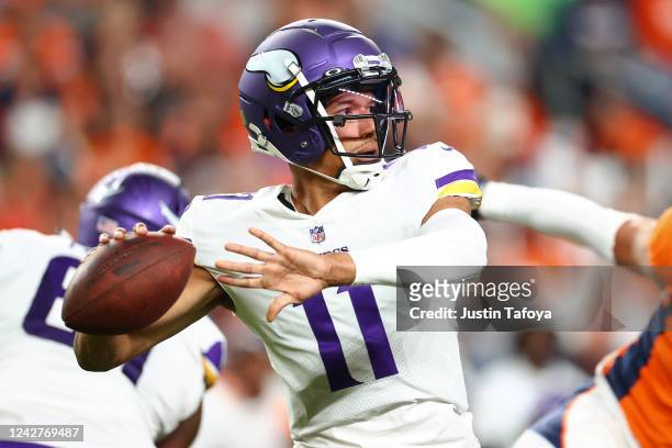 Kellen Mond of the Minnesota Vikings passes the ball during the second half of a preseason game against the Denver Broncos at Empower Field At Mile...