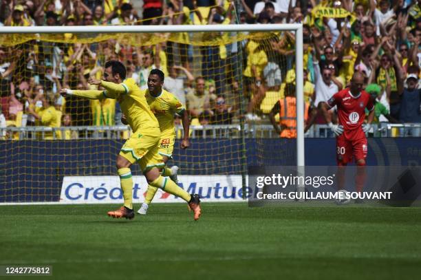 Nantes' Spanish midfielder Pedro Chirivella and Nantes' Egyptian forward Mostafa Mohamed celebrate after scoring a goal during the French L1 football...