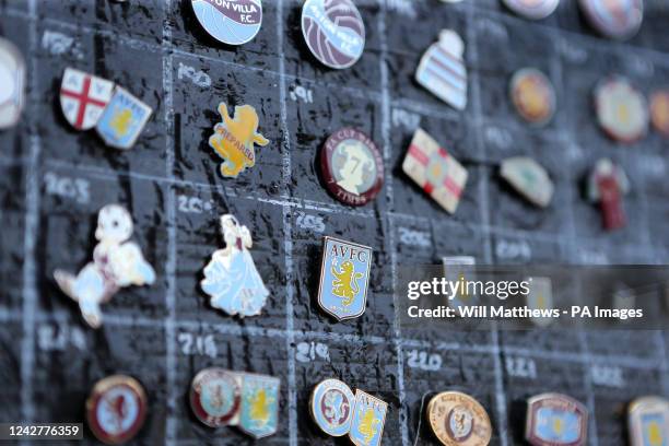 Aston Villa pin badges on sale outside the ground before the Premier League match at Villa Park, Birmingham. Picture date: Sunday August 28, 2022.