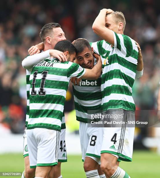Josip Juranovic celebrates making it 6-0 during a cinch Premiership match between Dundee United and Celtic at Tannadice, on August 28 in Dundee,...