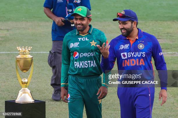 India's captain Rohit Sharma and Pakistan's captain Babar Azam arrive for the toss before start of the Asia Cup Twenty20 international cricket Group...