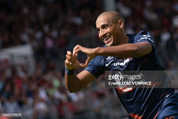 Montpellier's French forward Wahbi Khazri celebrates scoring his team's third goal during the French L1 football match between Stade Brestois 29 and...