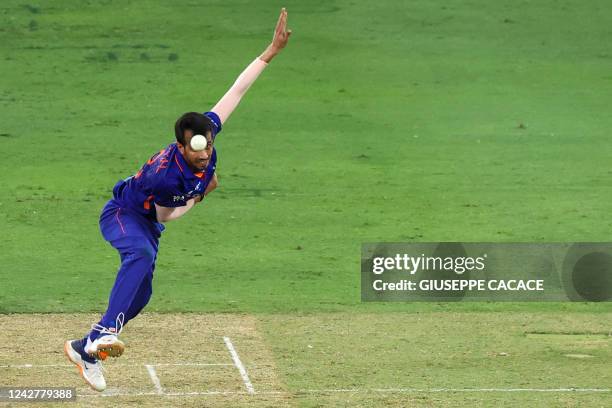 India's Yuzvendra Chahal delivers a ball during the Asia Cup Twenty20 international cricket Group A match between India and Pakistan at the Dubai...