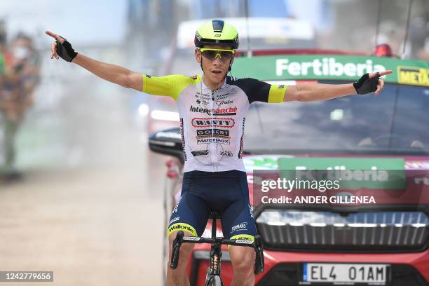 Team Intermarche Wanty-Gobert Materiaux's South African rider Louis Meintjies celebrates as he crosses the finish line in first place during the 9th...