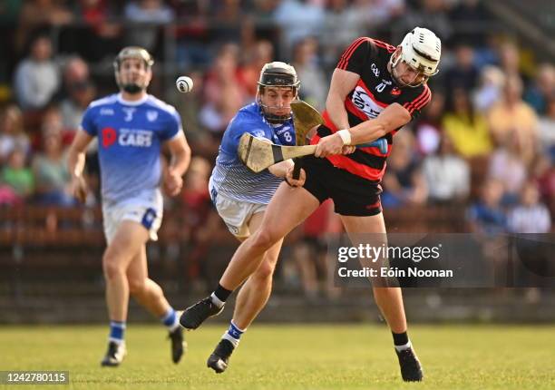 Waterford , Ireland - 28 August 2022; Dessie Hutchinson of Ballygunner in action against Jamie Barron of Fourmilewater during the Waterford Senior...