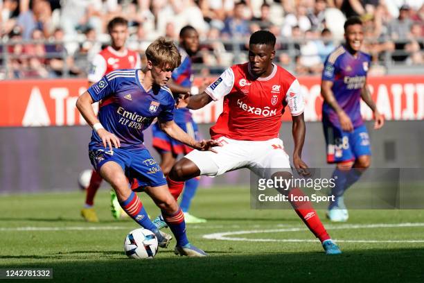 Johann LEPENANT - 15 Marshall MUNETSI during the Ligue 1 Uber Eats match between Reims and Lyon at Stade Auguste Delaune on August 28, 2022 in Reims,...