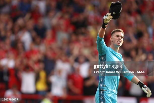 Dean Henderson of Nottingham Forest celebrates after saving the penalty of Harry Kane of Tottenham Hotspur during the Premier League match between...