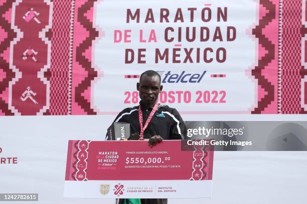 Edwin Kiprop Kiptoo from Kenia stands on the podium after winning the 2022 Mexico City Marathon on August 28, 2022 in Mexico City, Mexico.