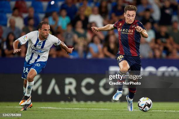 Jorge de Frutos of Levante UD in action next to Nacho of CD Tenerife during the LaLiga SmartBank match between Levante UD and CD Tenerife at Estadio...