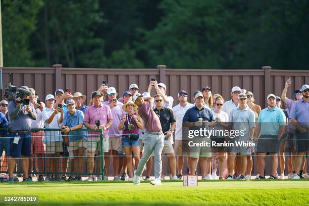 Xander Schauffele tees off on the eighth tee box during the third round of the TOUR Championship at East Lake Golf Club on August 27, 2022 in...