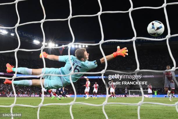 Monaco's German goalkeeper Alexander Nubel dives to catch a ball shot during the French L1 football match between Paris-Saint Germain and AS Monaco...