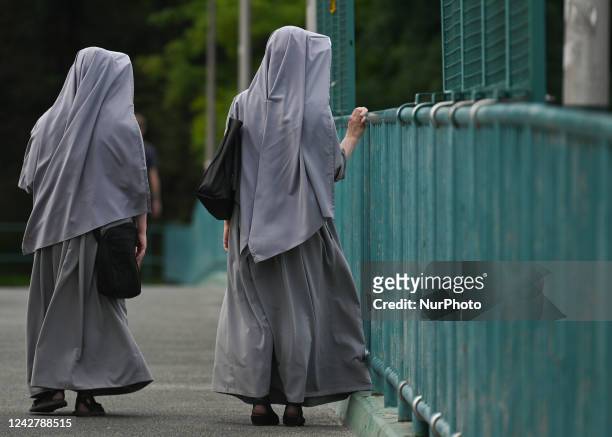 Two nuns seen on a bridge in Krakow-Podgorze. On Sunday, August 28 in Krakow, Lesser Poland Voivodeship, Poland.