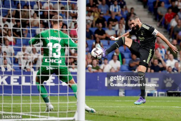 Karim Benzema of Real Madrid scores the third goal to make it 1-2 during the La Liga Santander match between Espanyol v Real Madrid at the RCDE...