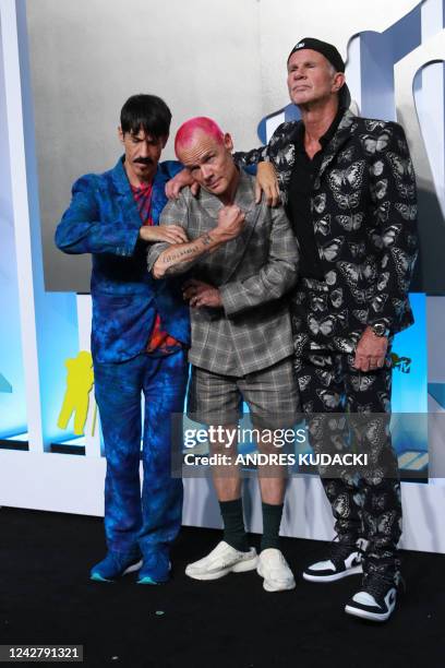 Rock band Red Hot Chili Peppers' members vocalist Anthony Kiedis , bassist Flea and drummer Chad Smith arrives for the MTV Video Music Awards at the...