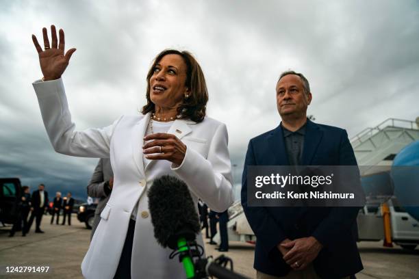 Vice President Kamala Harris speaks to members of the press, joined by Second Gentleman Doug Emhoff after disembarking from Air Force 2 at Orlando...