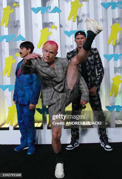 Rock band Red Hot Chili Peppers' members vocalist Anthony Kiedis , bassist Flea and drummer Chad Smith arrives for the MTV Video Music Awards at the...