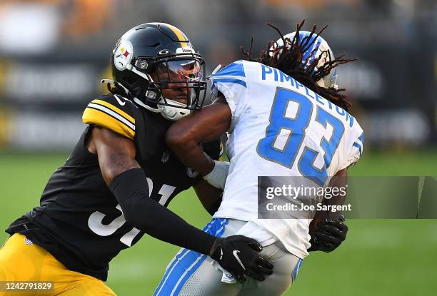 Justin Layne of the Pittsburgh Steelers makes a tackle on Kalil Pimpleton of the Detroit Lions during the fourth quarter at Acrisure Stadium on...