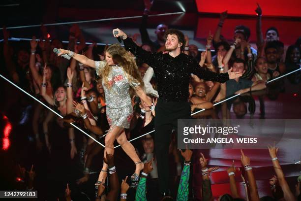 Singer Fergie and US rapper Jack Harlow perform onstage during the MTV Video Music Awards at the Prudential Center in Newark, New Jersey on August...