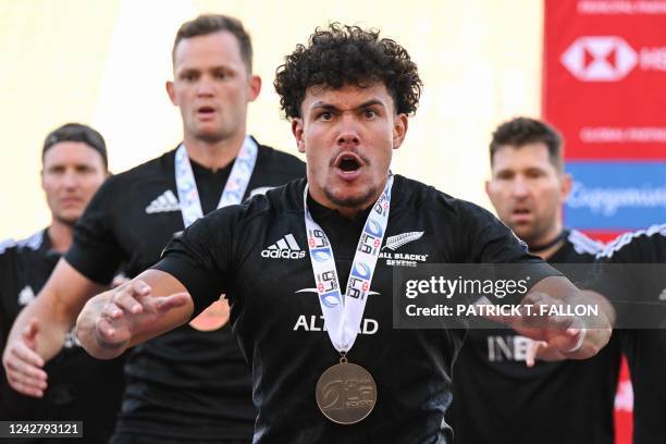 New Zealand's All Blacks Sevens team performs the haka after the rugby union final match between New Zealand and Fiji on the second day of the Los...