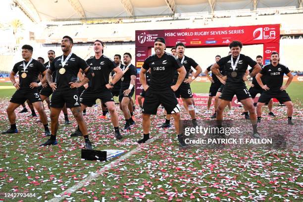 New Zealand's All Blacks Sevens team performs the haka after the rugby union final match between New Zealand and Fiji on the second day of the Los...