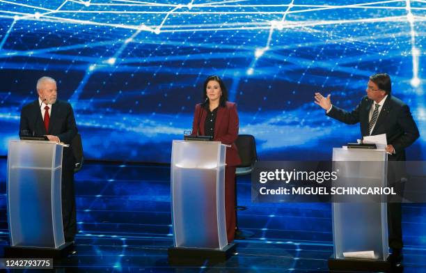 Brazilian presidential candidates Luiz Inacio Lula da Silva , Simone Tebet , Jair Bolsonaro take part in the presidential debate ahead of the October...