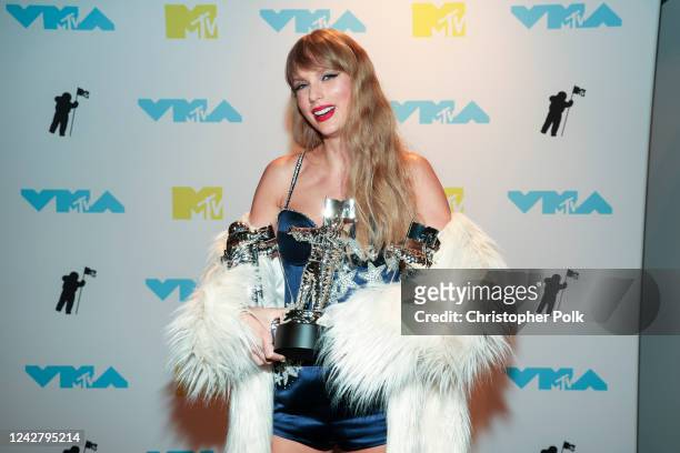 Taylor Swift, winner of the Best Video, Best Direction, and Best Long Form Video awards, poses in the press room at the 2022 MTV Video Music Awards...