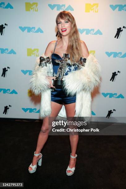 Taylor Swift, winner of the Best Video, Best Direction, and Best Long Form Video awards, poses in the press room at the 2022 MTV Video Music Awards...