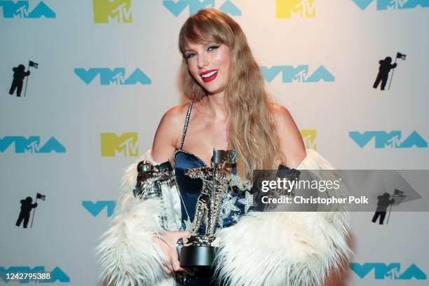 Taylor Swift, winner of the Best Video, Best Direction, and Best Long Form Video awards, poses in the press room at the 2022 MTV Video Music Awards...