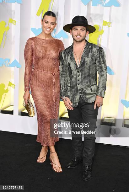 Brittany Carel and Christian Breslauer at the 2022 MTV Video Music Awards held at Prudential Center on August 28, 2022 in Newark, New Jersey.