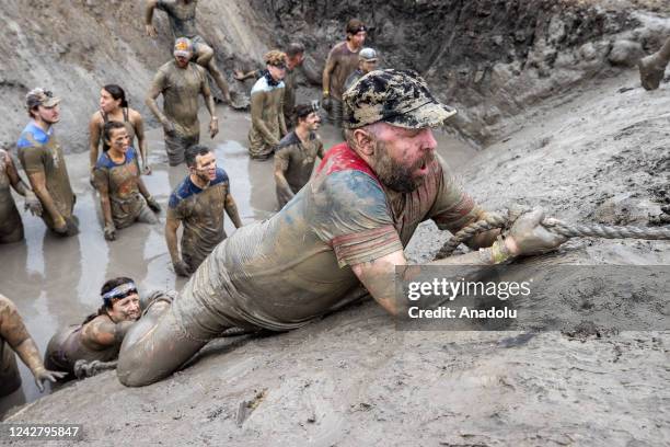 Competitors take part in "Tough Mudder" in Sonoma, California, United States on August 28, 2022. Tough Mudder is an endurance event series in which...