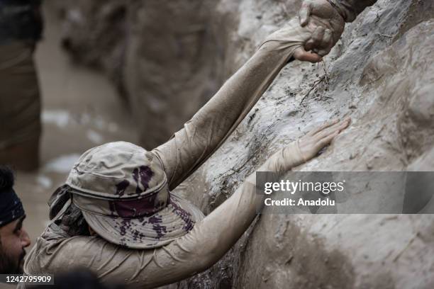 Competitors take part in "Tough Mudder" in Sonoma, California, United States on August 28, 2022. Tough Mudder is an endurance event series in which...