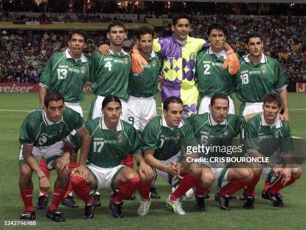 Mexico's Confederations Cup final team poses for photographers 04 August before the game against Brazil in Mexico City. P. Pardo, R. Marquez, J....