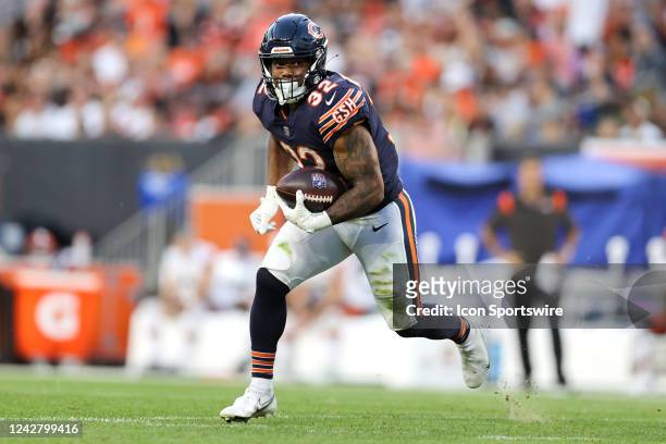 Chicago Bears running back David Montgomery carries the football during the second quarter of the National Football League preseason game between the...
