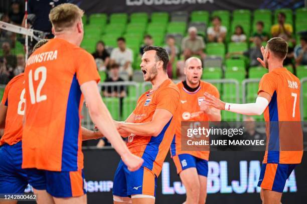 Netherlands volleyball players react during the World Volleyball Championship Pool F match between Argentina and Netherlands at the Arena Stozice in...