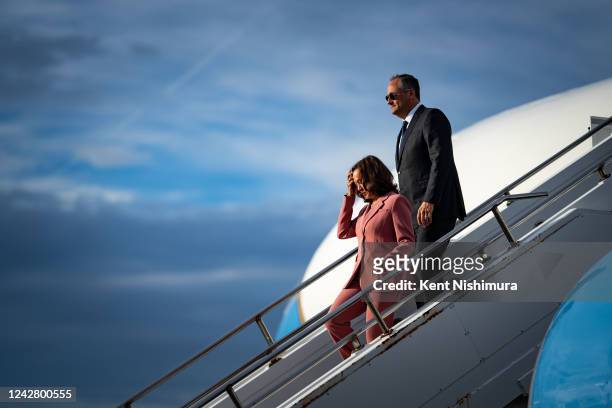 Vice President Kamala Harris and Second Gentleman Doug Emhoff disembarks from Air Force 2 at the Shuttle Landing Facility at Kennedy Space Center on...