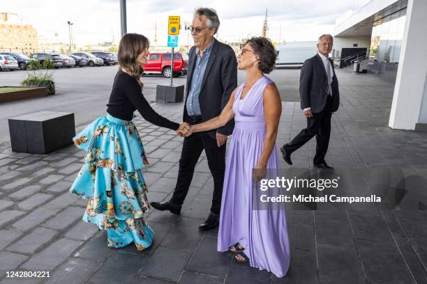 Princess Sofia of Sweden attends the Funkisfestivalen and is greeted by organizers Bjorn Kansvag and Anna Epstein at the Stockholm Waterfront on...