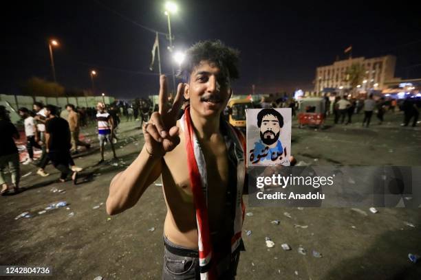 Supporters of Iraqi cleric Muqtada al-Sadr continue to wait near the parliament building in Baqhdad, Iraq on August 29, 2022. The move came shortly...