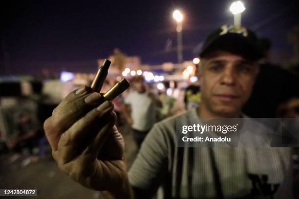 Supporters of Iraqi cleric Muqtada al-Sadr continue to wait near the parliament building in Baqhdad, Iraq on August 29, 2022. The move came shortly...