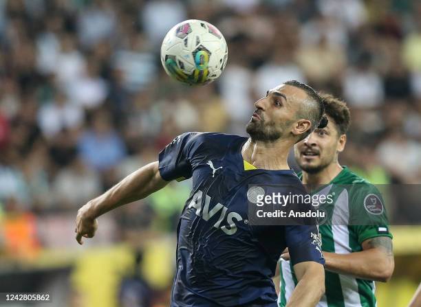 Serdar Dursun of Fenerbahce in action against Ahmet Oguz of Arabam.com Konyaspor during the Turkish Super Lig week 4 soccer match between Arabam.com...