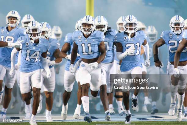 The North Carolina Tar Heels run out of the tunnel to start the college football game between the North Carolina Tar Heels and the Florida A&M...