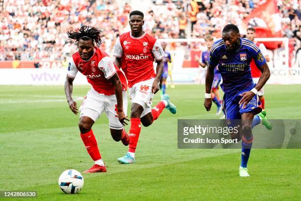 Andreaw GRAVILLON - 07 Karl TOKO EKAMBI during the Ligue 1 Uber Eats match between Reims and Lyon at Stade Auguste Delaune on August 28, 2022 in...